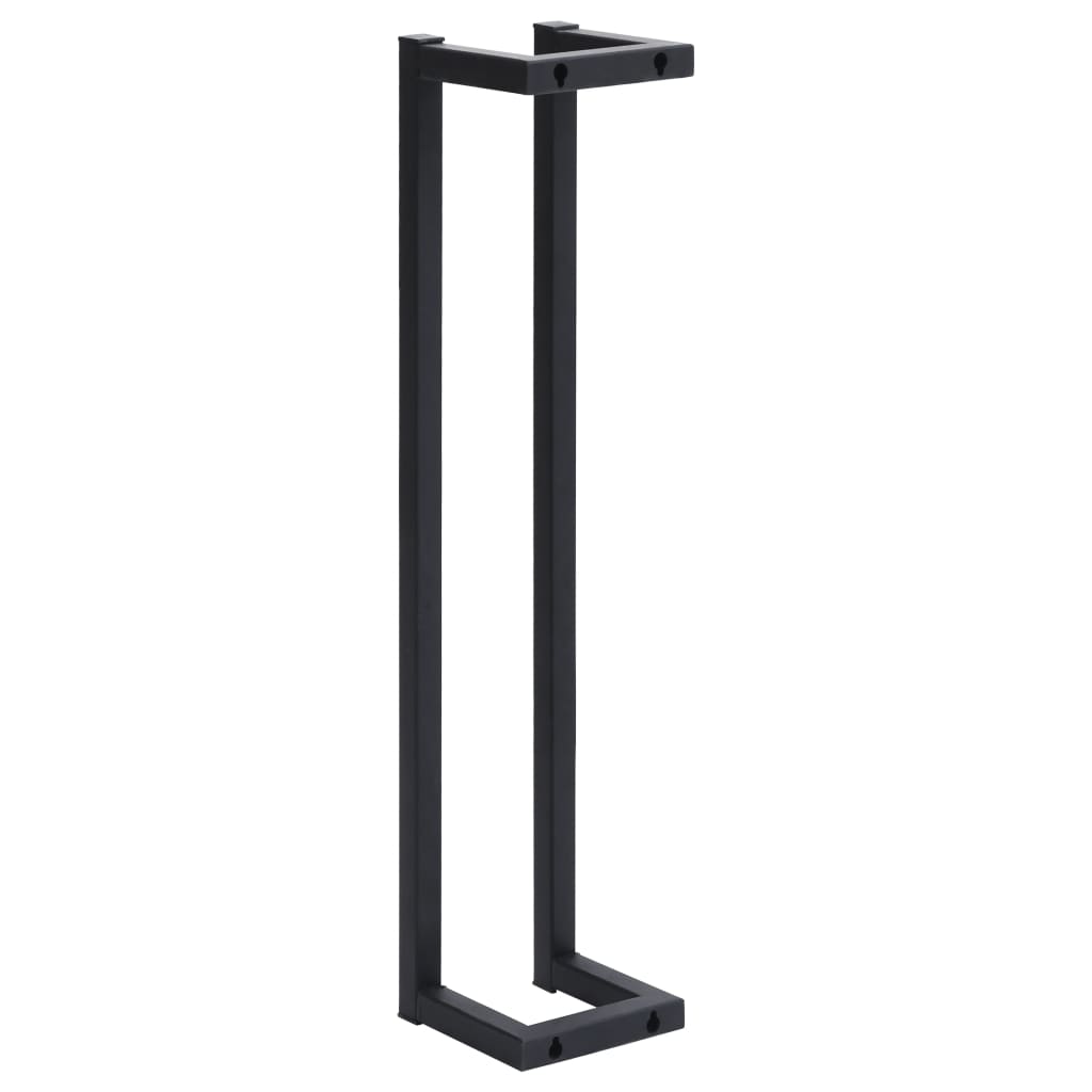Black iron towel rack with towels, styled bathroom scene