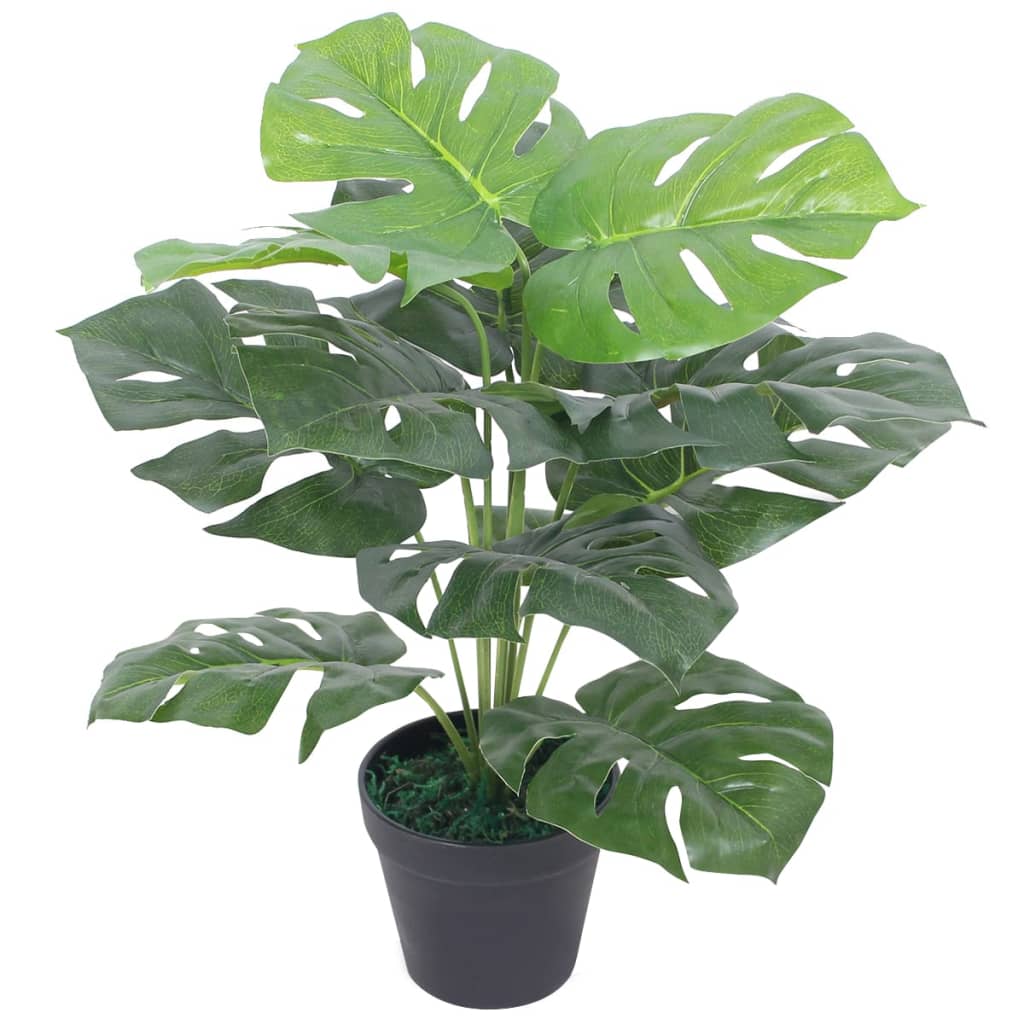 Detail of artificial monstera split leaves