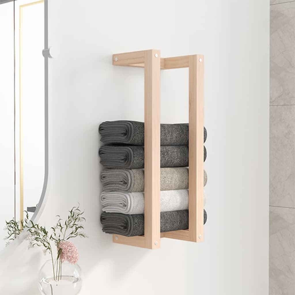 Wall-mounted pine towel rack holding rolled towels in a bathroom