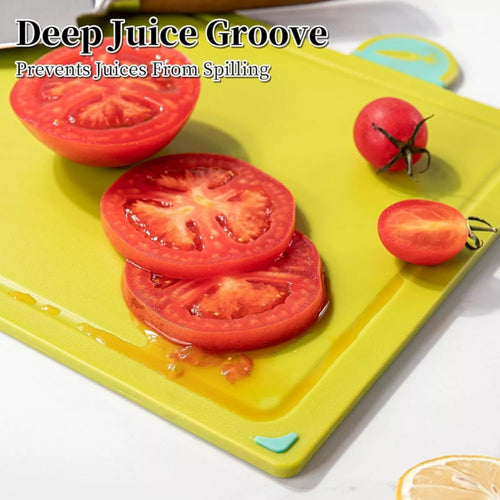 Four colour-coded cutting boards laid out side by side