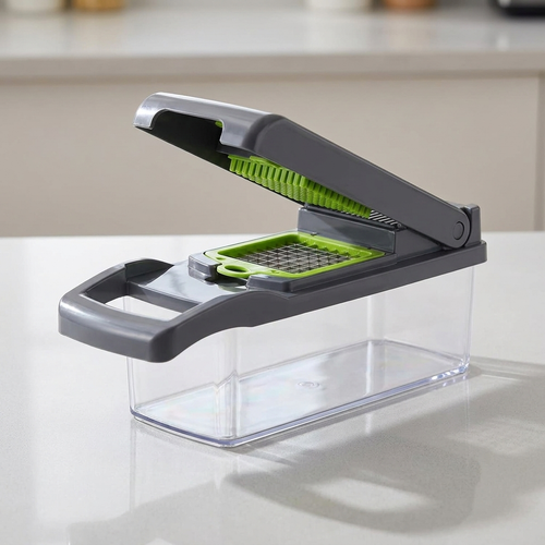 Casora 15-in-1 vegetable chopper with transparent collection container on a kitchen counter
